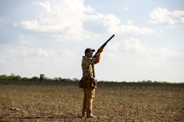 a man holding a gun